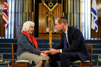 Prince William, Prince of Wales speaks with Renee Salt, 94, a Holocaust survivor, at the Western Marble Arch Synagogue on February 29, 2024 in London 
