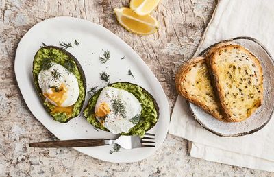 Avocado smash on toast with poached eggs
