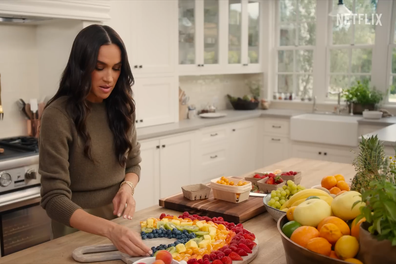 Meghan, the Duchess of Sussex, shows how to make a rainbow fruit salad on the set of With Love, Meghan.