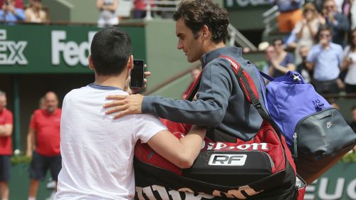 Federer blasts officials after fan jumps French Open fence