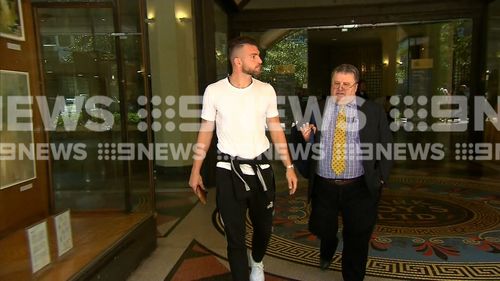 Simic appeared before an Australian court this morning, accused of indecently touching a woman he sat next to on a flight into Sydney.