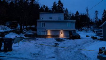 Police tape surrounds the home where four University of Idaho students were killed in November 2022.