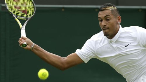 Nick Kyrgios during his first round match at Wimbledon. (AAP)