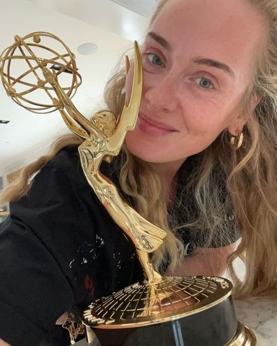 Adele celebrates her Emmy win. 