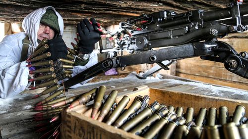 A fighter sits in a machine-gun nest in territory controlled by pro-Russian militants, near Spartak village in the Donetsk region.