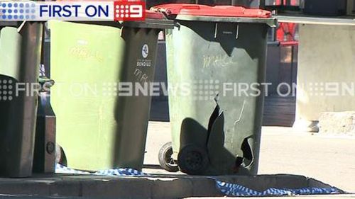 One of the homemade devices was found in one of these bins. (9NEWS)