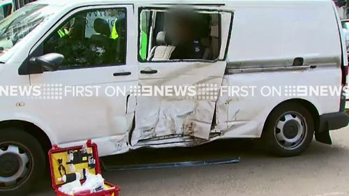 Two police officers were injured when the stolen ute crashed into the unmarked police van. (9NEWS)