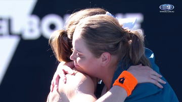 Jelena Dokic and Alize Cornet embrace on the court.