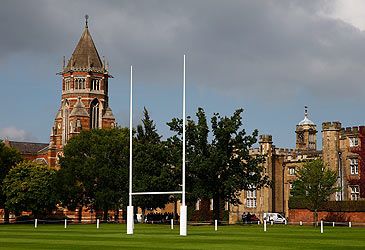 When were the first laws of rugby written by students at Rugby School?