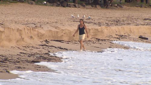 Spectators were drawn to the coastline to observe the spectacle. (9NEWS)