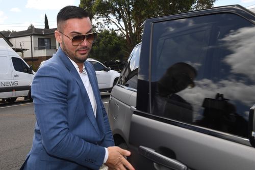 Salim Mehajer returns home as police continue to raid his home in Lidcombe. (AAP)
