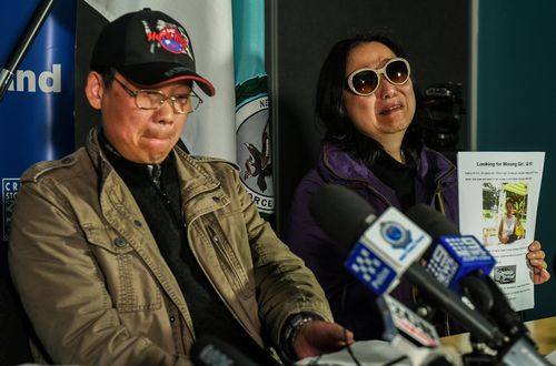 Zhihe and Qing He Yu address the media after arriving from China following the alleged murder of their daughter Qi, whose body is still missing. (AAP)