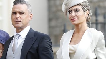 British singer Robbie Williams arrives with his wife Ayda Fields, right, and his mother-in-law Gwen Fields for the wedding of Princess Eugenie of York and Jack Brooksbank at St George&#x27;s Chapel, Windsor Castle.