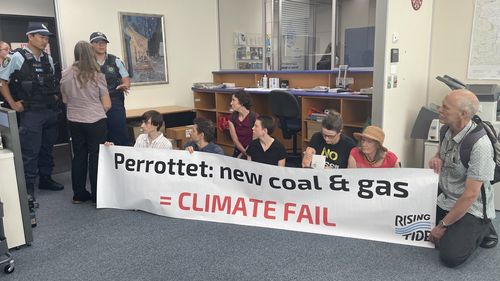 Climate protesters storm NSW Premier Dominic Perrottet's office