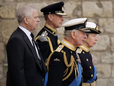 Prince Andrew, Duke of York, Prince Edward, Earl of Wessex, King Charles III and Anne, Princess Royal walk behind the Queen's funeral cortege on September 19, 2022 in London.