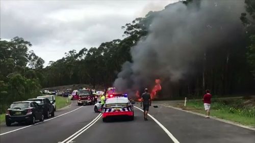 The car burst into flames after the crash.