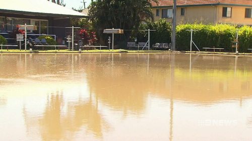 A burst water main in Brisbane's south has sent a raging torrent of water through a home and local bowling club. Picture: 9NEWS.