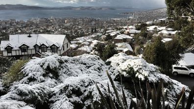 IN PICTURES: Hobart wakes up to first major snowfall in almost 30 years (Gallery)