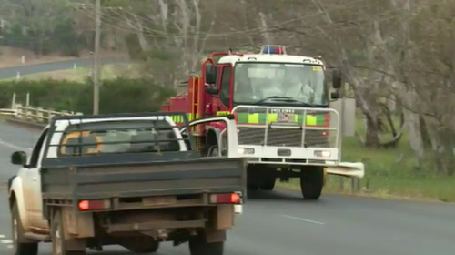 Fire crews remain at the scene. (9NEWS)