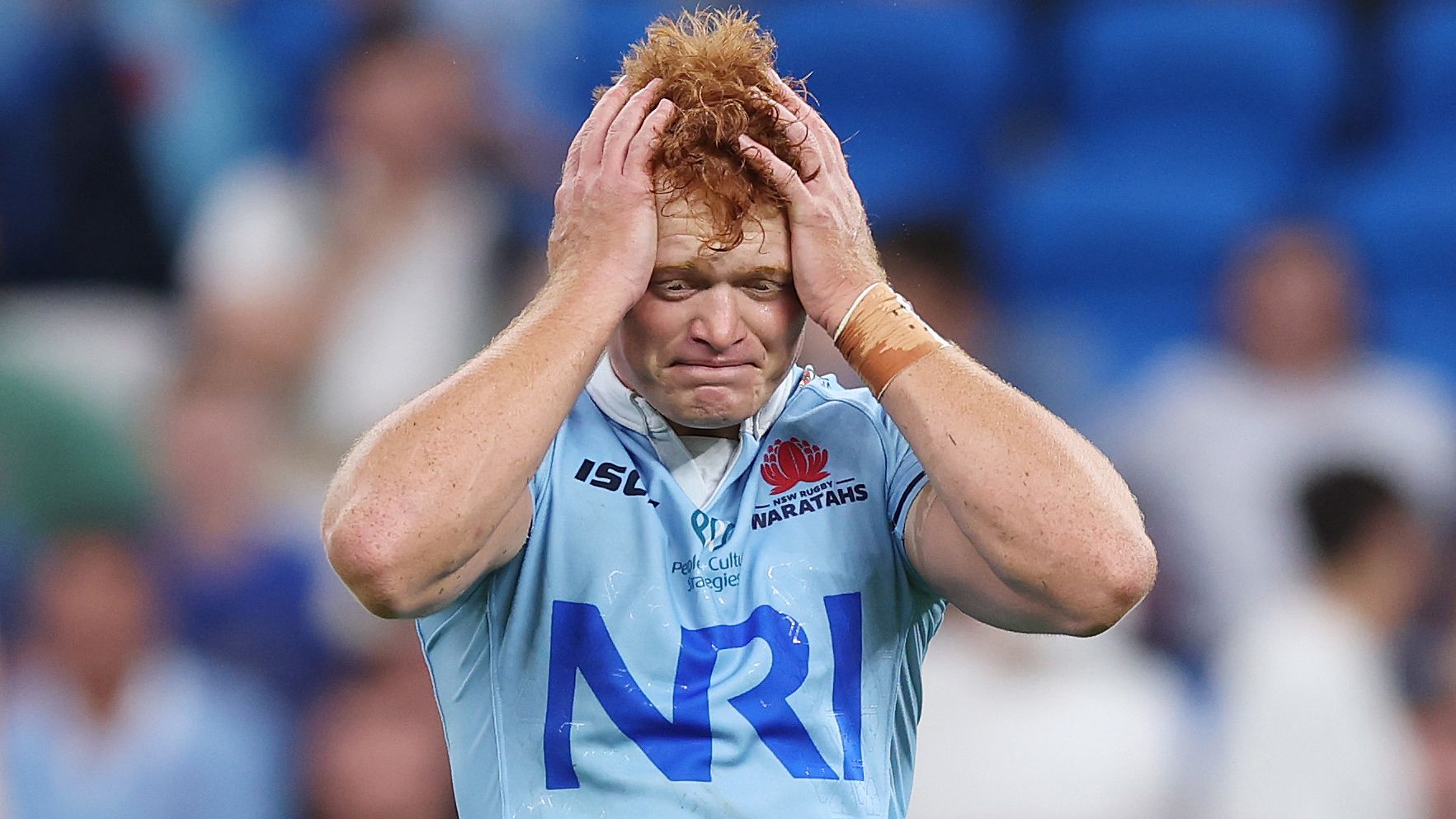 Tane Edmed of the Waratahs reacts after missing a penalty goal to win the match.