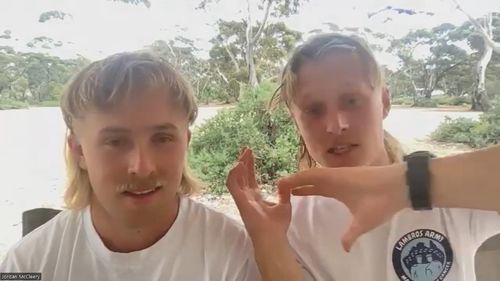 Brothers Stefan and Lachlan Lamble were caught up in the chaos on their mission to run and walk across Australia to raise money for cancer research.