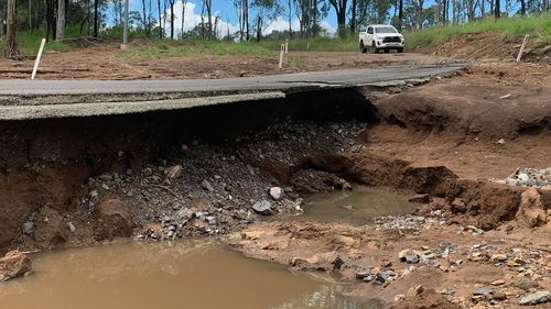 This Queensland road is another reminder to be careful on the roads.Brooweena–Woolooga Road right now—and another reminder why it's important to wait for us to declare a road safe again before you drive on it!