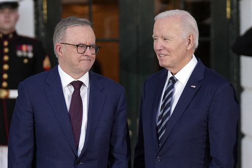 President Joe Biden and Australia's Prime Minister Anthony Albanese pose for photos at the White House Tuesday, Oct. 24, 2023. 