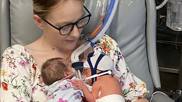 Queensland twins born on side of road in back of ambulance.