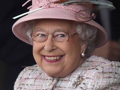 Britain's Queen Elizabeth II smiles as she attends an event at Newbury Racecourse in Newbury England, Friday April 21, 2017.