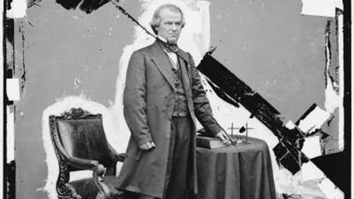 This 1865-1880 photo made available by the Library of Congress shows a damaged glass negative of President Andrew Johnson.