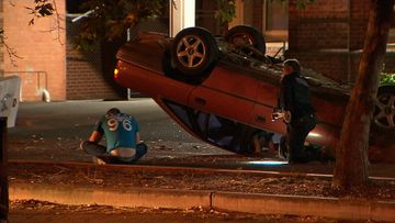 Driver flips his car in school car park during police pursuit
