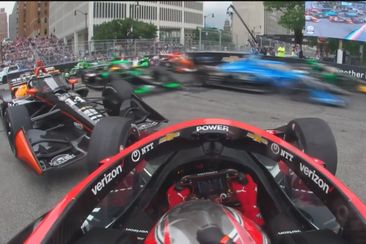 Will Power was left stranded blocking the track after being spun on the opening lap of the Detroit IndyCar Grand Prix.