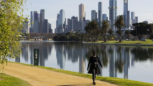 People exercising at Albert Park Lake  in Melbourne