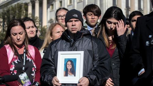 Ilan Alhadeff holds a photograph of his daughter, Alyssa Alhadeff, 14, killed during the shooting at Marjory Stoneman Douglas High School in Parkland, Florida. (AAP)