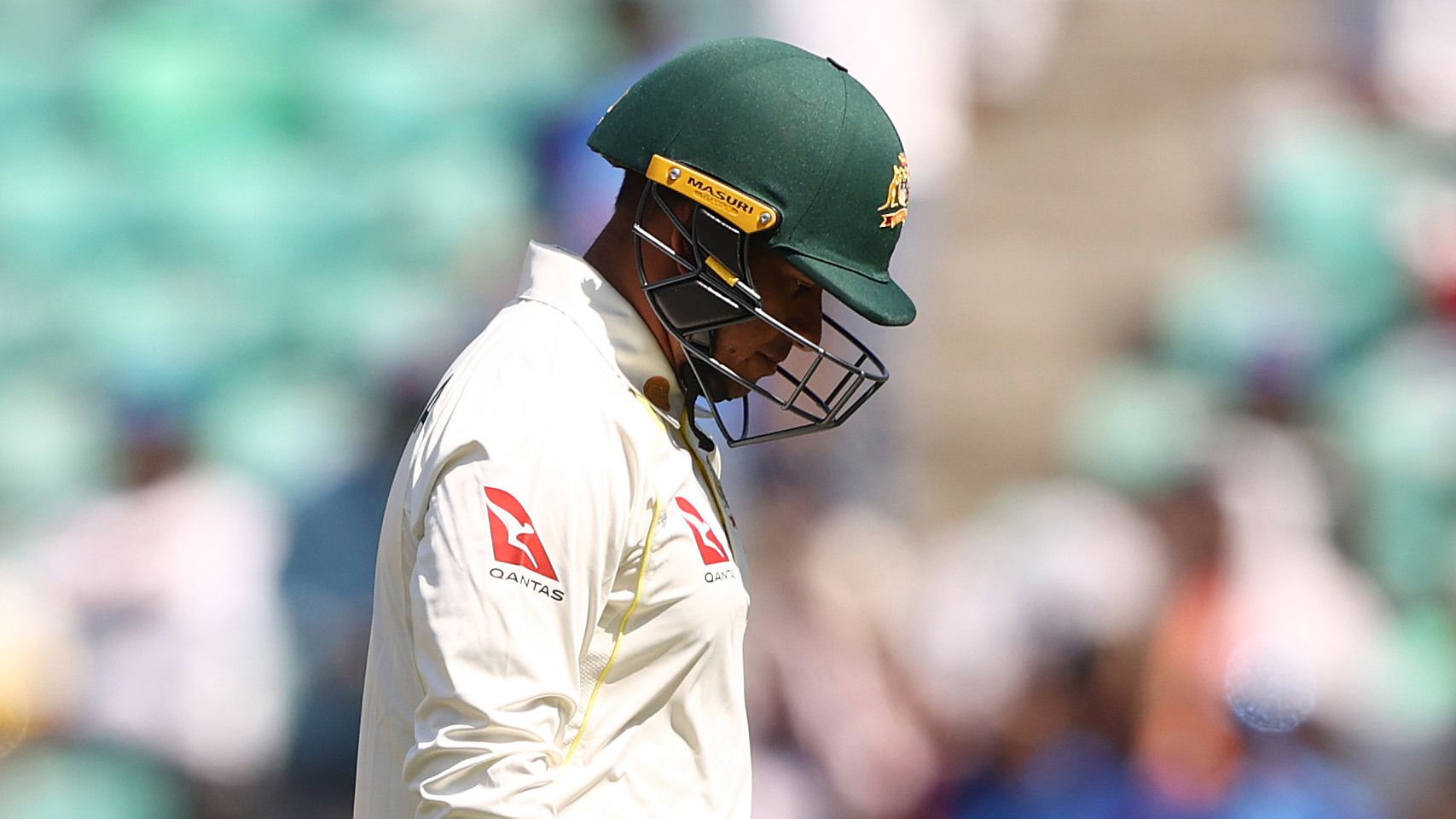 Usman Khawaja of Australia walks off after he was dismissed by Ravichandran Ashwin of India during day three of the First Test match in the series between India and Australia at Vidarbha Cricket Association Ground on February 11, 2023 in Nagpur, India. (Photo by Robert Cianflone/Getty Images)