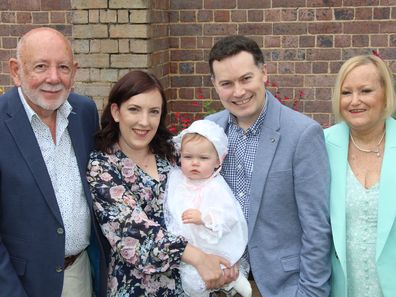 Emma McCabe with parents and grandparents. 