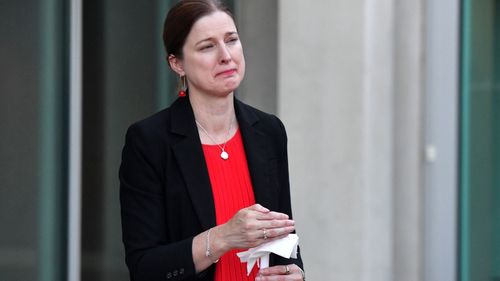 Shadow Minister for Ageing Julie Collins attends a candlelight vigil by parliamentarians, for domestic violence murder victim Hannah Clarke and her children, at Parliament House in Canberra, Wednesday, February 26, 2020