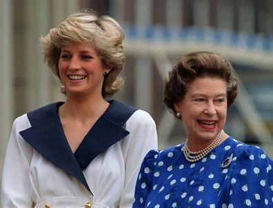 Diana, Princess of Wales, left, and Britain's Queen Elizabeth II smile to well-wishers outside Clarence House in London. Aug. 4, 1987  