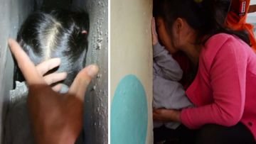Delicate mission to rescue girl with head stuck between walls