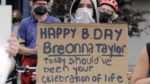 A person holds a sign Friday, June 5, 2020, that mentions Breonna Taylor, a black woman killed by Kentucky police on March 13, during a protest Friday, June 5, 2020, in Tacoma, Wash., against police brutality. Taylor would have turned 27-years-old on Friday. (AP Photo/Ted S. Warren)