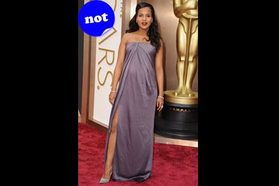 Why are you trying to hide your baby bump in that enormous muumuu, Kerry?! Loving the cheeky leg-pop though!