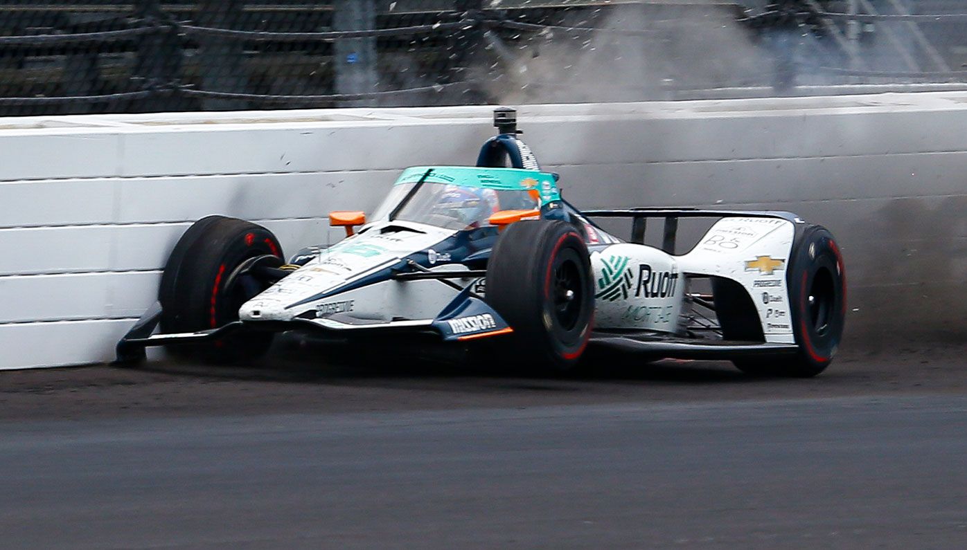 Fernando Alonso hits the wall during practice for the Indy500.