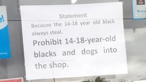 Melbourne milk bar places racist sign on window banning black teenagers