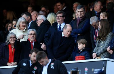 Prince William, Duke of Cambridge speaks to their son Prince George of Cambridge prior to the Guinness Six Nations Rugby match between England and Wales at Twickenham Stadium on February 26, 2022.