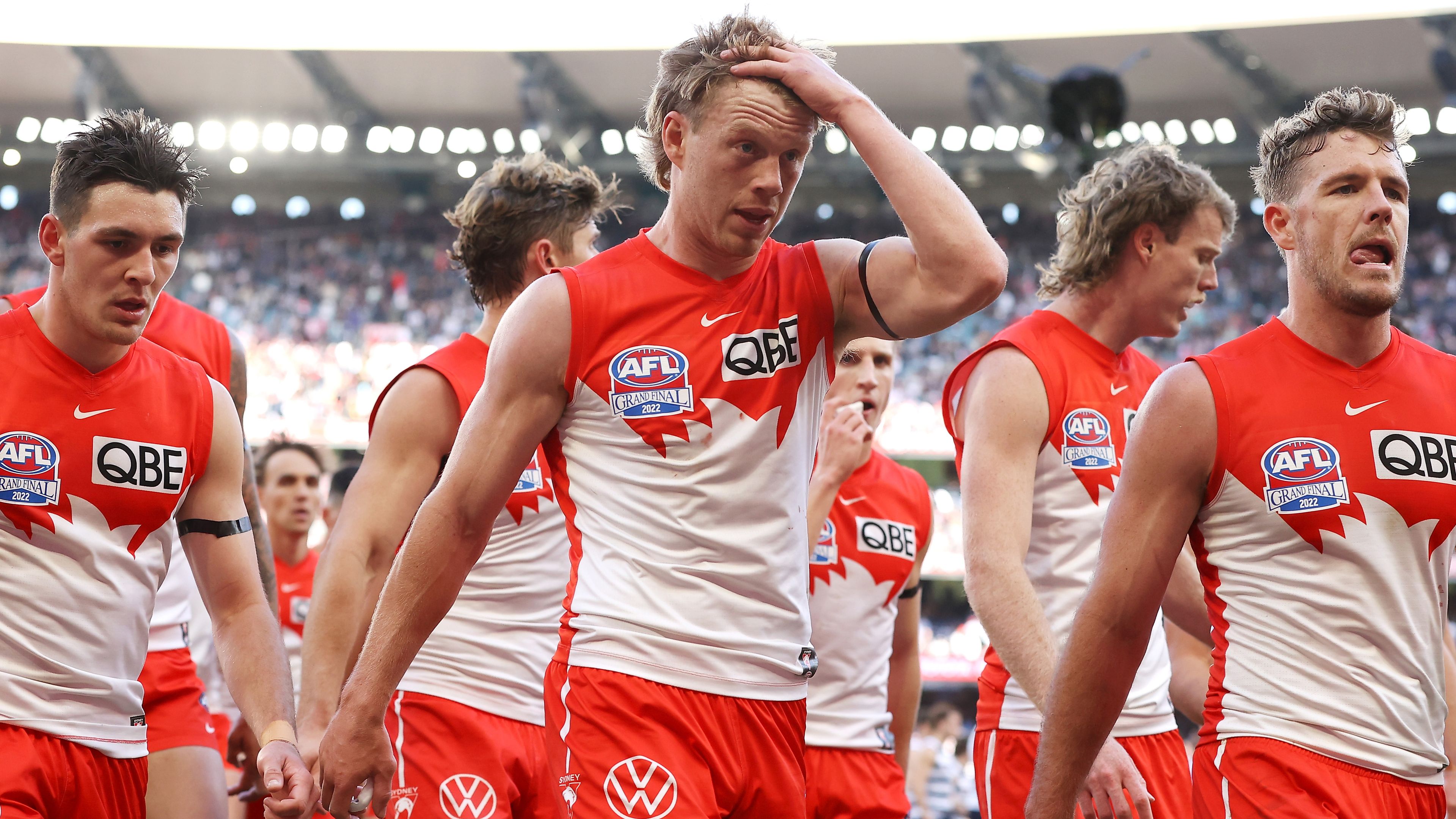 Callum Mills of the Swans holds his head as the Swans leave the field with his team at half-time during the 2022 AFL Grand Final match between the Geelong Cats and the Sydney Swans at the Melbourne Cricket Ground on September 24, 2022 in Melbourne, Australia. (Photo by Mark Kolbe/AFL Photos/via Getty Images)