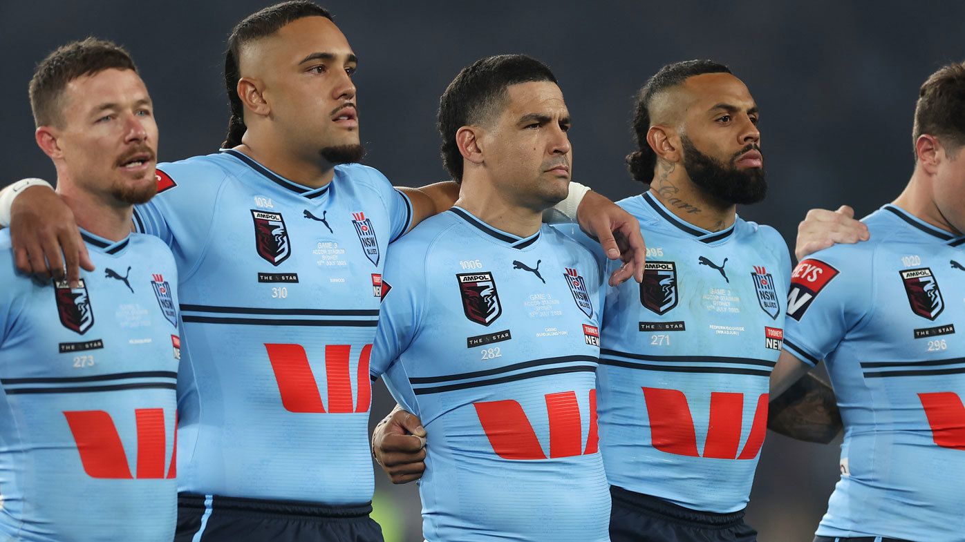 NSW Blues players line up for the anthem before State of Origin III, 2023.