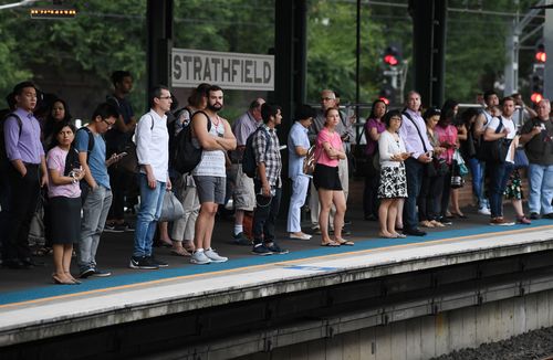 Commuters waiting at Strathfield station this morning. (AAP)