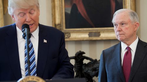 US President Donald Trump speaks alongside US Attorney General Jeff Sessions after Mr Sessions was sworn in as Attorney General in the Oval Office on February 9, 2017. (AFP)