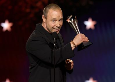 SANTA MONICA, CALIFORNIA - JANUARY 04: Stephen Graham, winner of the Best Actor in a Limited Series or Movie Made for Television Award for "Adolescence", speaks onstage during the 31st Annual Critics Choice Awards at Barker Hangar on January 04, 2026 in Santa Monica, California.  (Photo by Kevin Winter/Getty Images for Critics Choice Association)