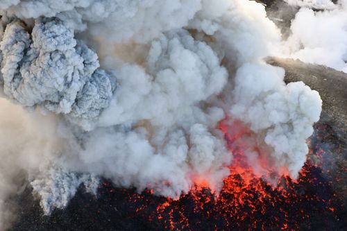 The volcano erupted violently several times, shooting up ash and smoke up to 2,300 metres. (AP)